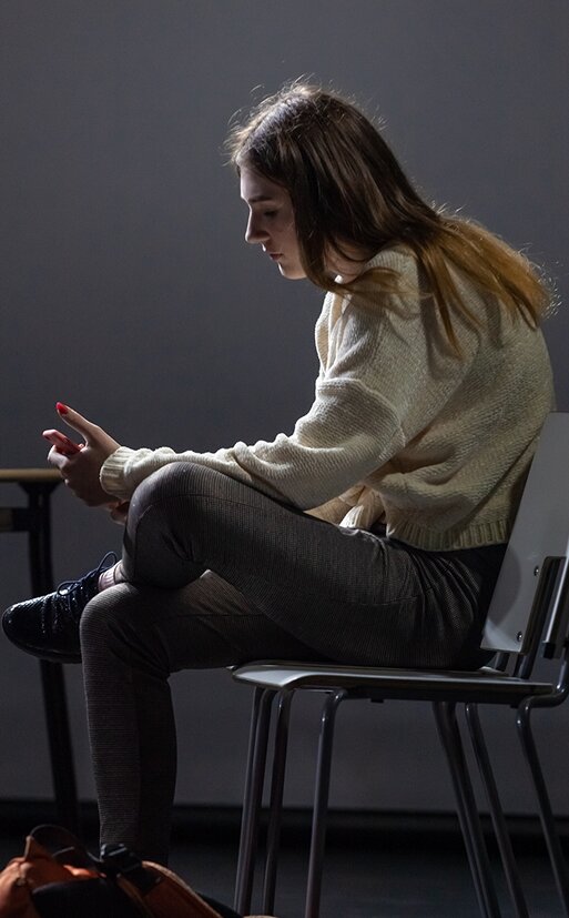Person sitting on chair